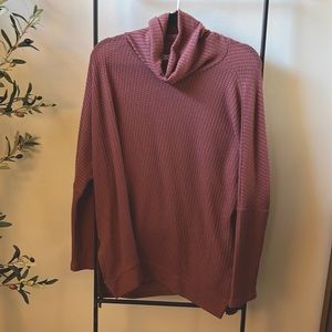 A thin waffle mock neck sweater